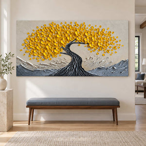 Wide flowering tree art above a slim dark bench.
