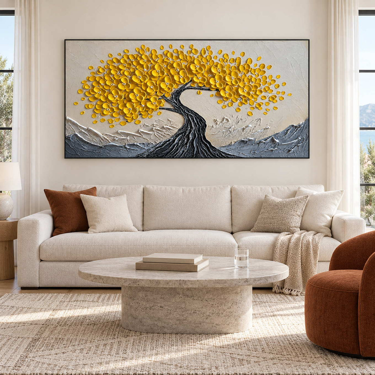 Yellow blossom tree painting above a cream sofa.