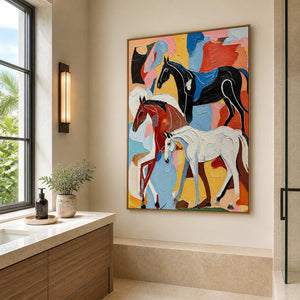 Wood framed colorful horse artwork beside a stone vanity in a bathroom dry area.