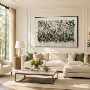 Green textured wall art styled in a living room.