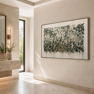 Textured green wall art in a modern interior.