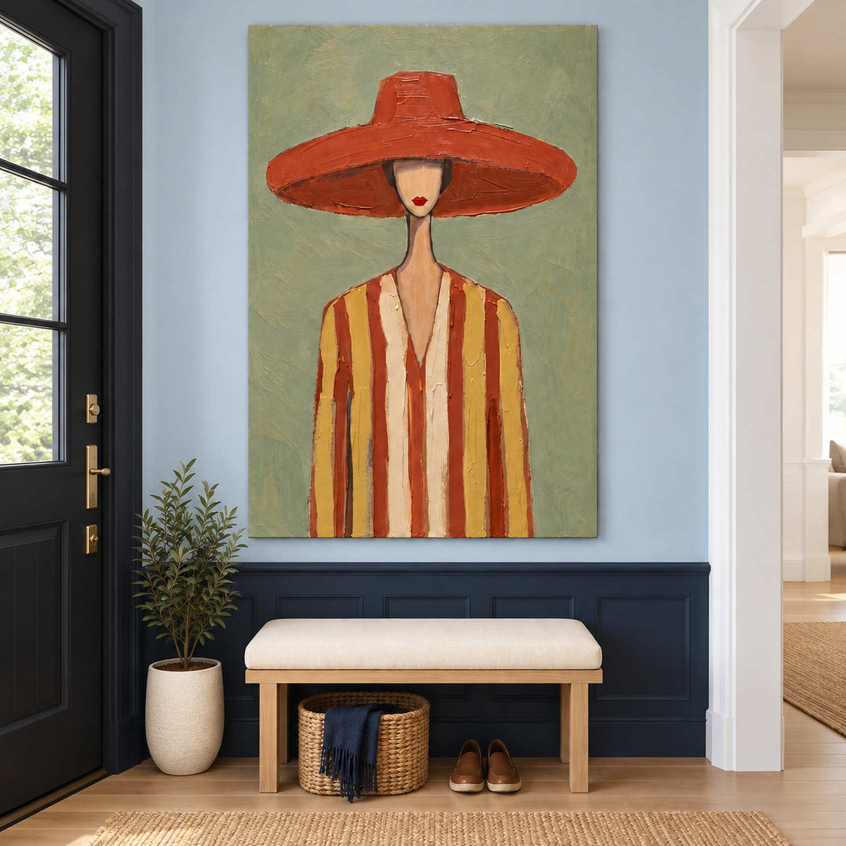 Striped figure painting over a pale bench above navy entryway paneling.