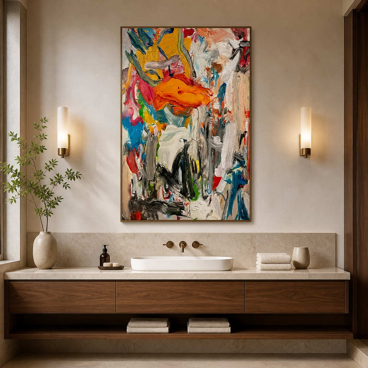 Wood framed colorful abstract artwork above a white basin between warm wall lamps.