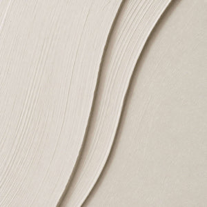 Close-up of raised hand-painted texture and layered surface details.