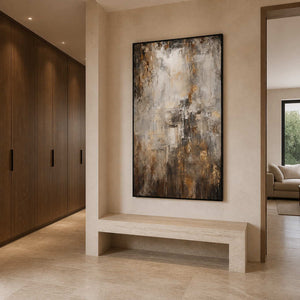 Tall textured abstract wall art grounding a warm modern entryway.