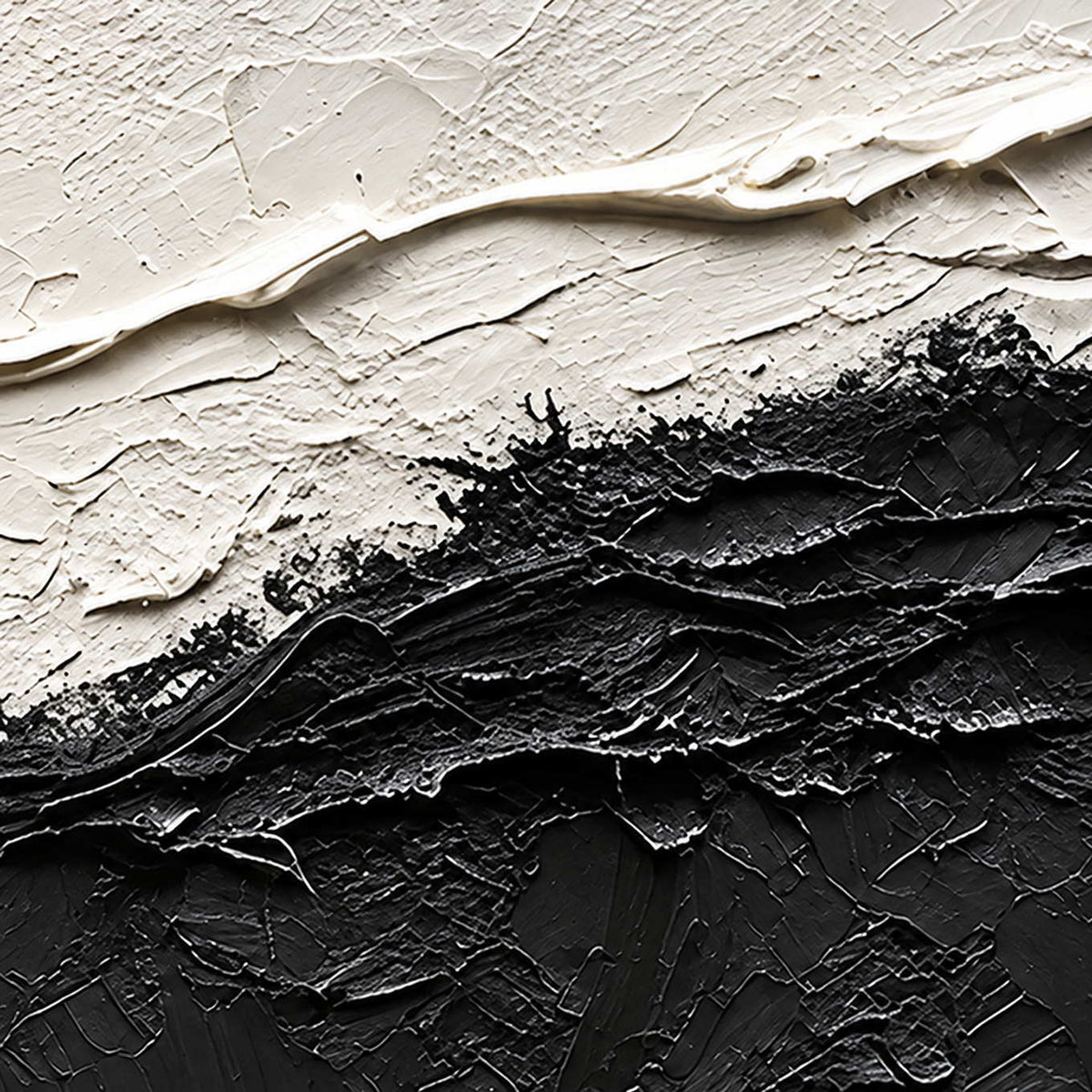 Detail of uneven white ridges meeting scraped and ridged black texture along the diagonal divide.