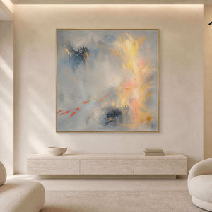 Luminous square abstract wall art in a warm modern living room.