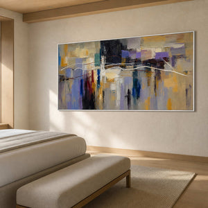 Textured abstract wall art displayed in a refined boutique hotel suite.