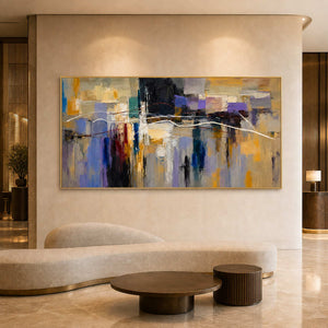 Textured abstract wall art displayed in a refined design hotel lobby.