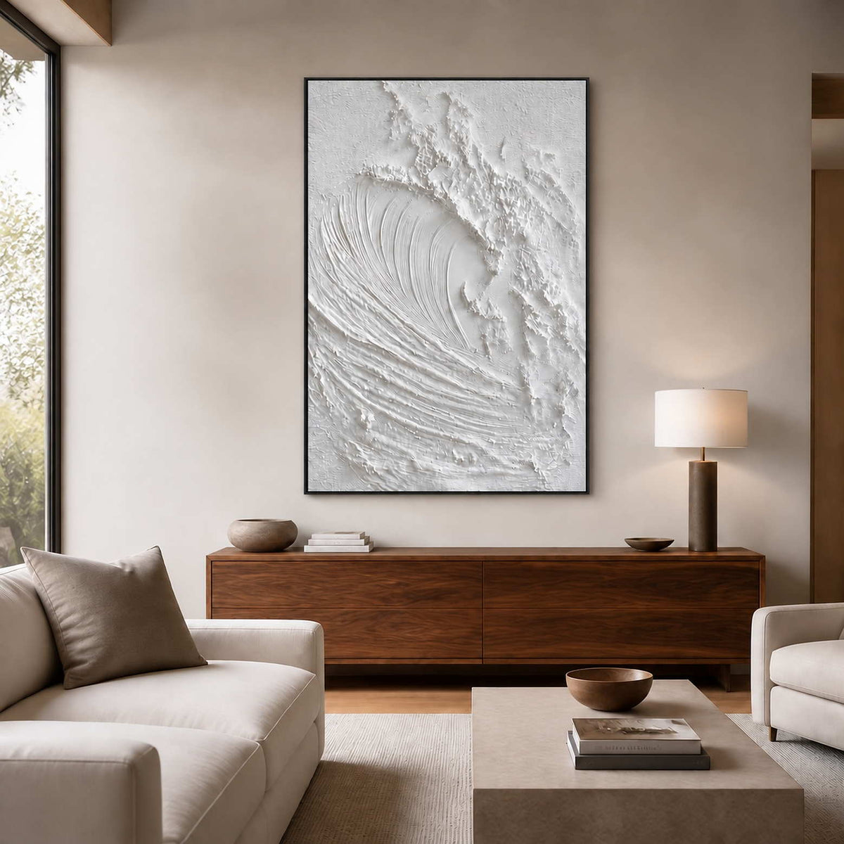 Listening to the Sea displayed above a walnut sideboard in a softly lit living room with cream seating.