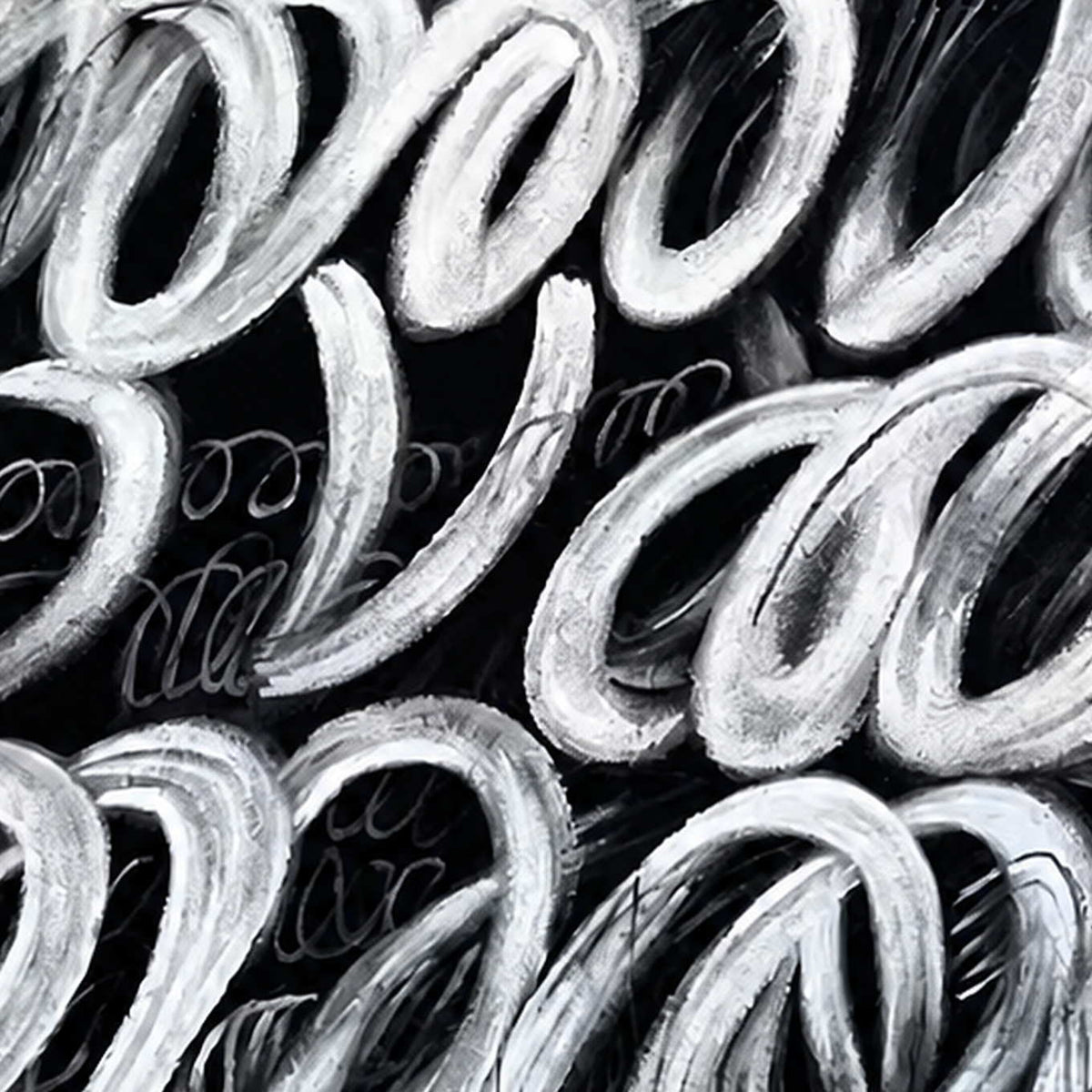 Close view of layered white looping brushstrokes and fine marks over black.