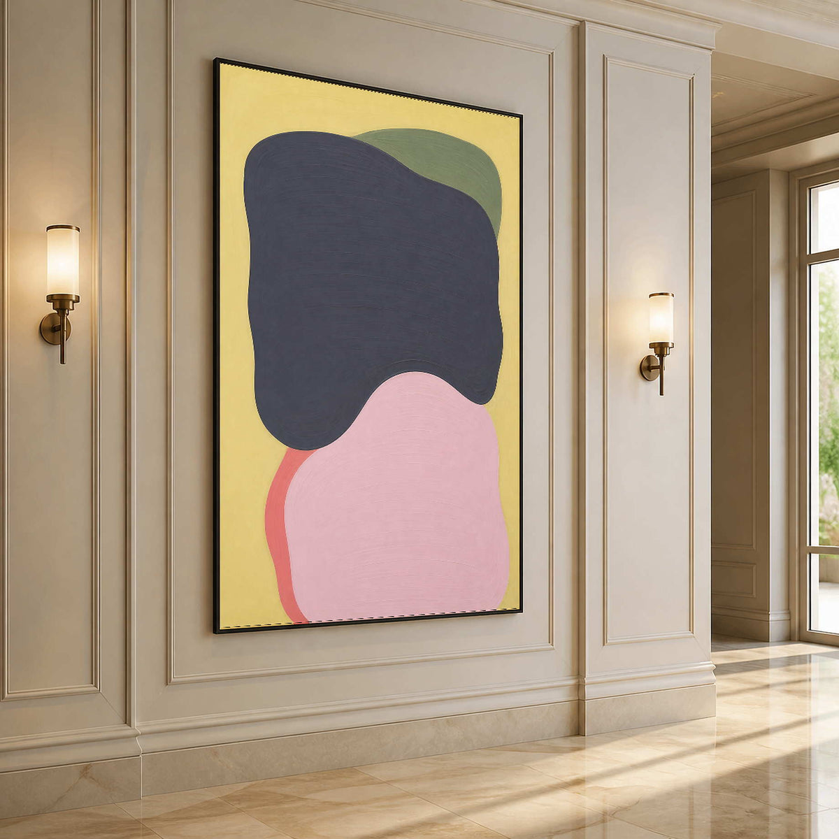 Organic charcoal and pink wall art displayed along a bright hallway.