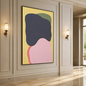 Organic charcoal and pink wall art displayed along a bright hallway.