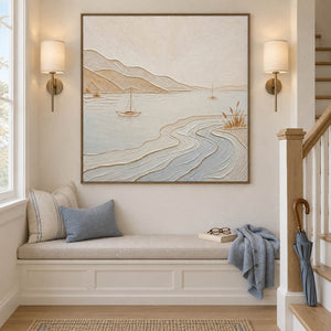 Pale coastal painting with sailboats, sandy hills, and curving wave contours in a brown wood frame on a stair landing.