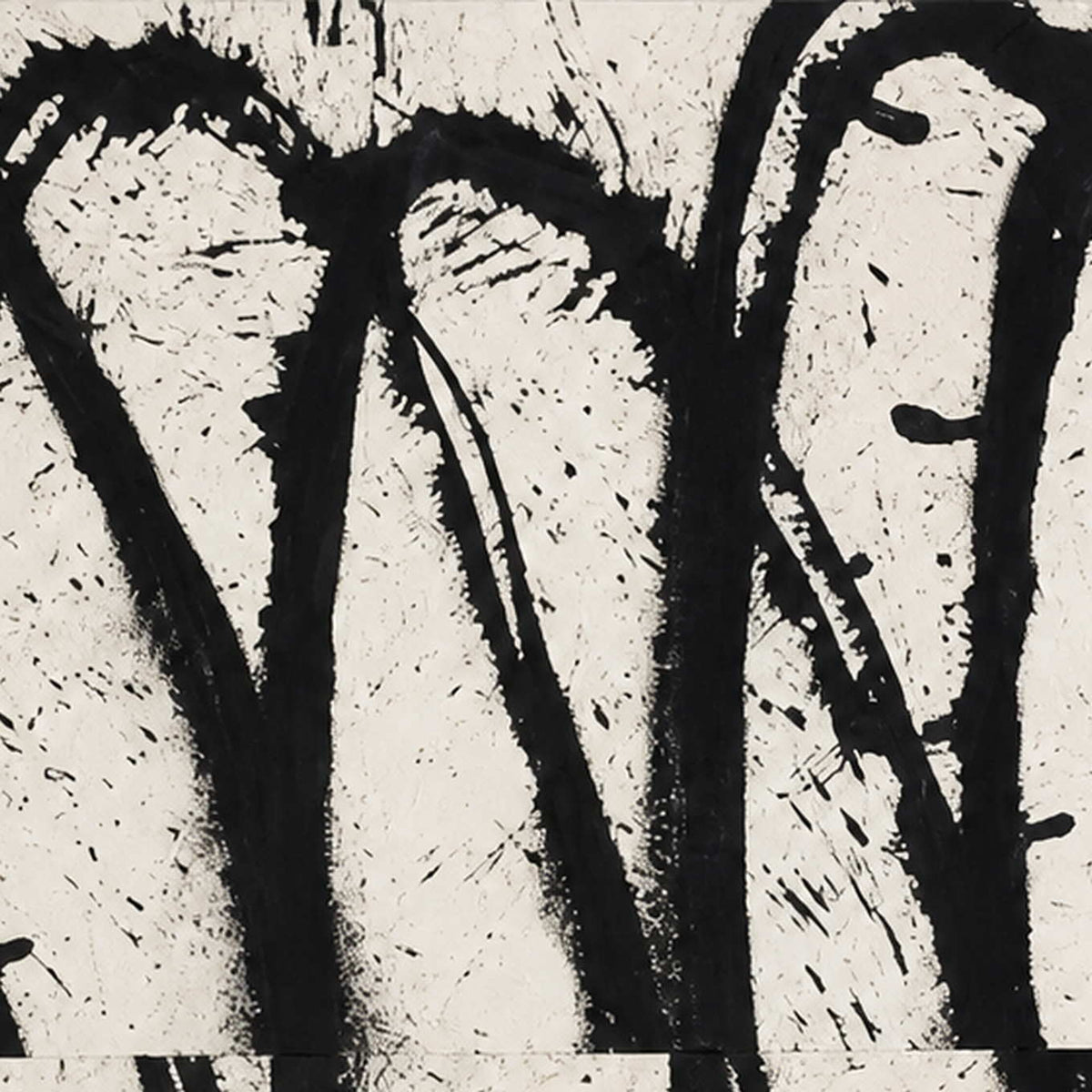 Close view of rough black looping brushwork and scattered marks across an off-white painted surface.