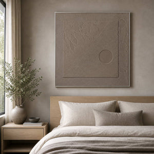 Square textured wall art displayed in a mushroom-gray oak bedroom.