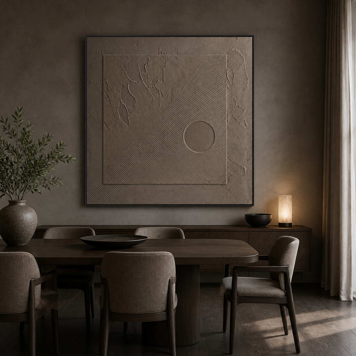 Earth-toned geometric artwork displayed in a charcoal walnut dining room.