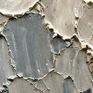 Close-up of thick ivory and slate-gray palette-knife wave texture.