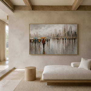 Rainy cityscape wall art displayed in a warm gray stone living room.