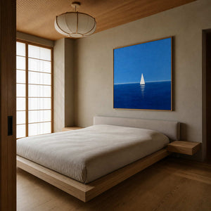 Blue sailboat wall art displayed in a serene wood-lined bedroom.