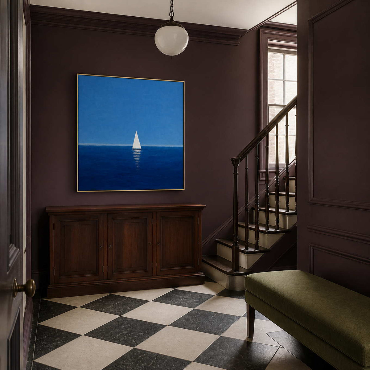Blue sailboat wall art displayed in a classic residential stair hall.