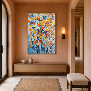 Vertical orange floral artwork displayed in a warm entryway.