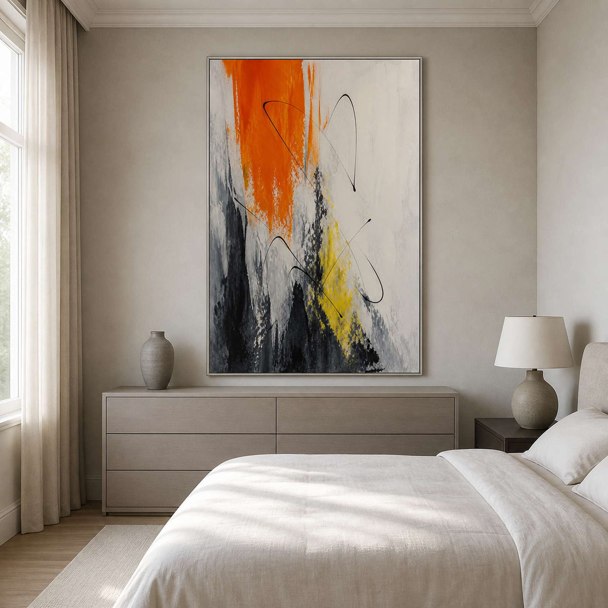 Orange, black, and white wall art displayed in a soft neutral bedroom.