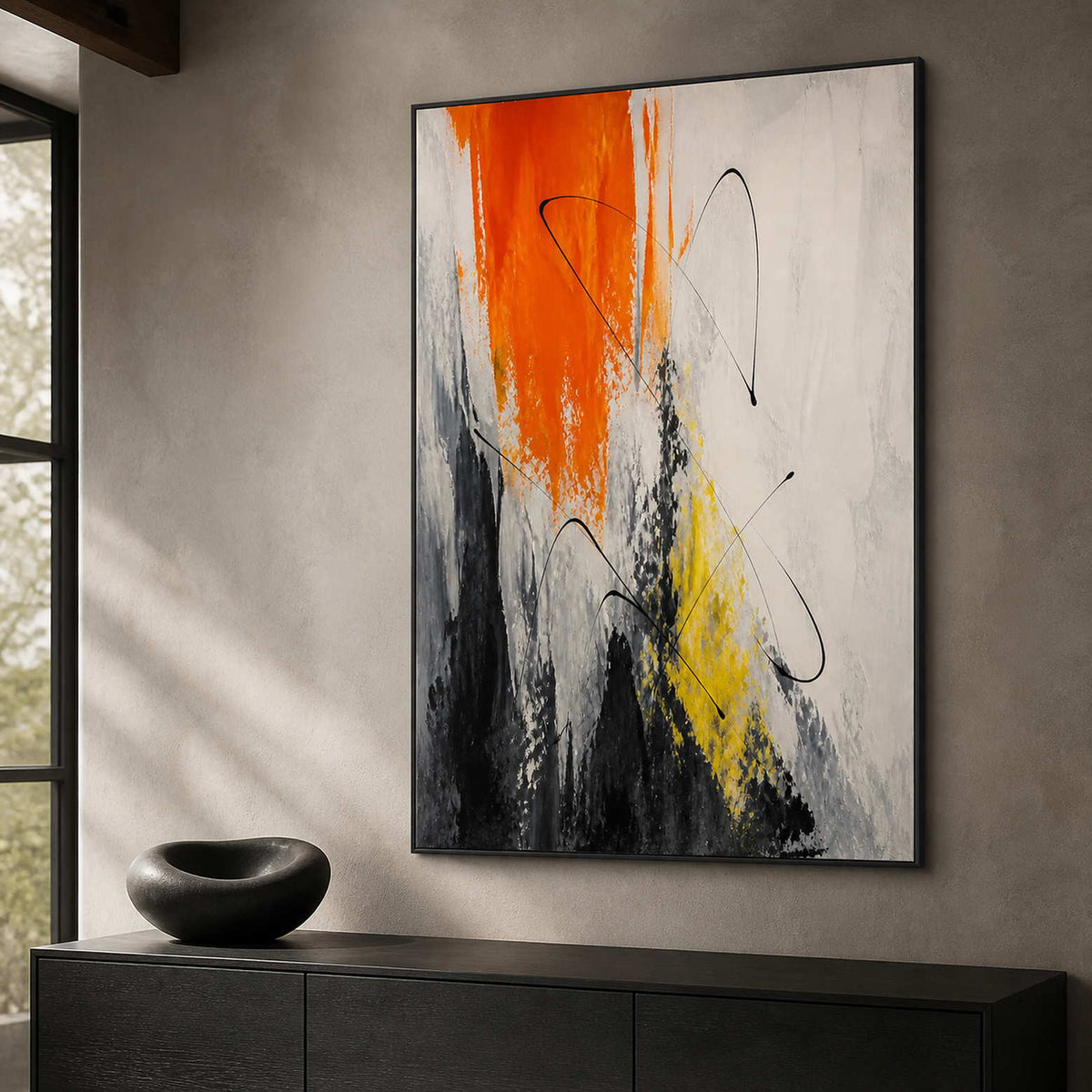 Modern gestural wall art displayed above a black oak office cabinet.