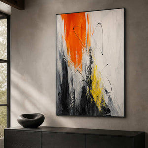 Modern gestural wall art displayed above a black oak office cabinet.