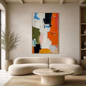 Bold orange textured abstract wall art in a neutral modern living room.
