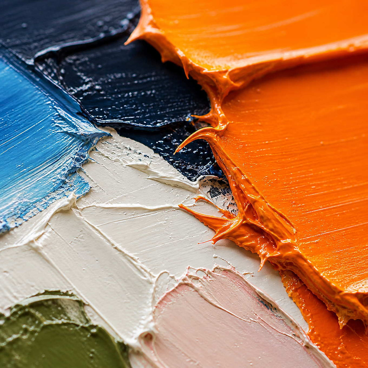 Close-up of thick orange, navy, ivory, and olive palette-knife texture.