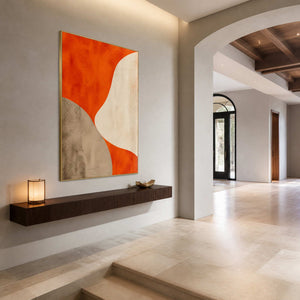 Orange Curves Hold the Center in a gold-framed entryway