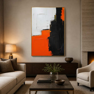 Orange, black, and ivory textured abstract wall art in a neutral living room.