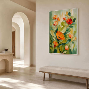 Green and orange floral canvas in a cream arched entryway.