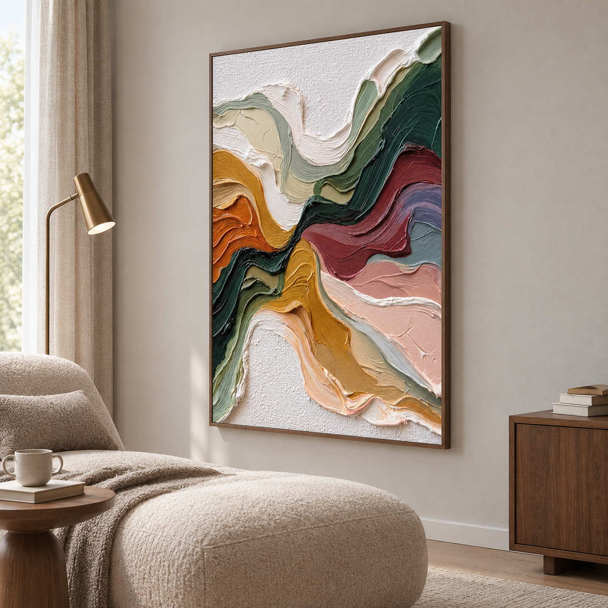 Angled view of the textured abstract beside a cream chaise and small reading lamp.