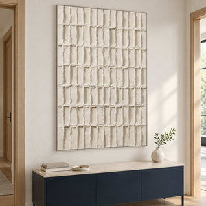 Angled grid artwork above a blue entry cabinet.