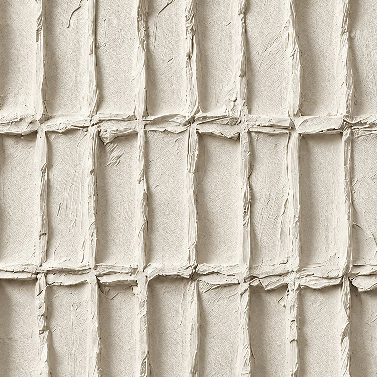 Close-up of uneven ivory rectangle borders and soft recessed shadows.