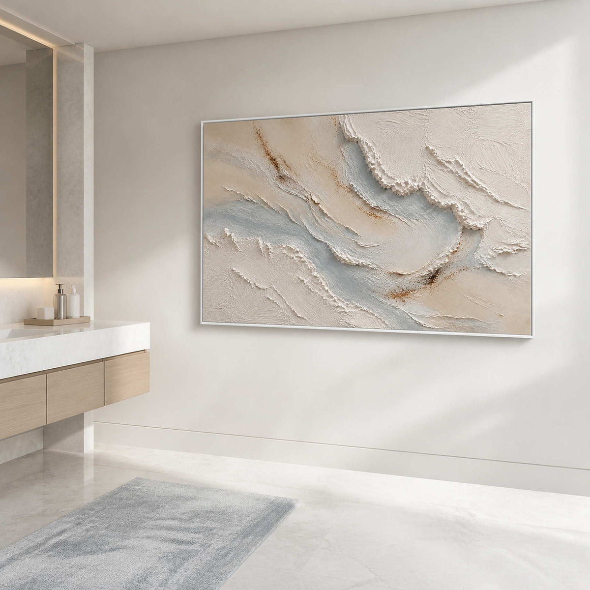 Airy ivory and blue coastal wall art in a spa-like bathroom.