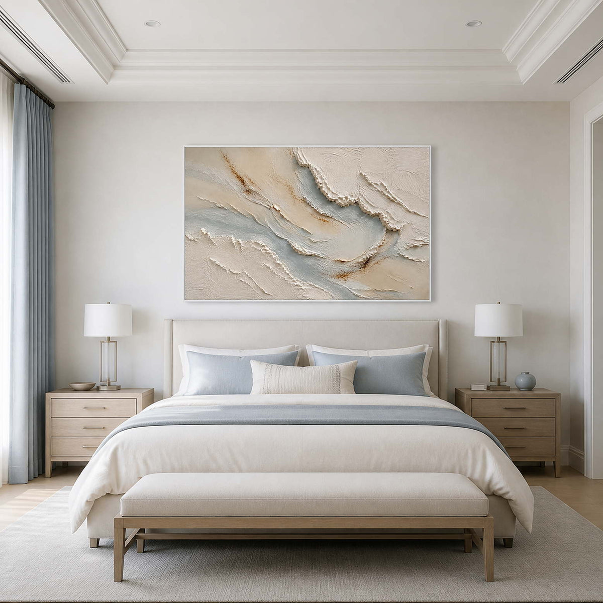 Calm ivory and blue textured wall art above a refined bedroom bed.
