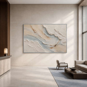 Serene textured coastal wall art displayed in an upscale hotel lobby.