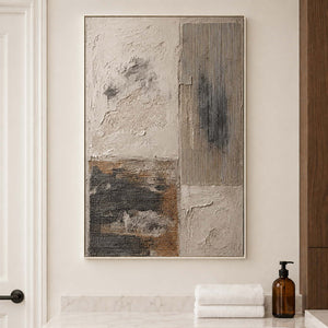 Weathered ivory and beige textures with gray blocks and dark marks in a white frame, displayed in a bathroom dry area.