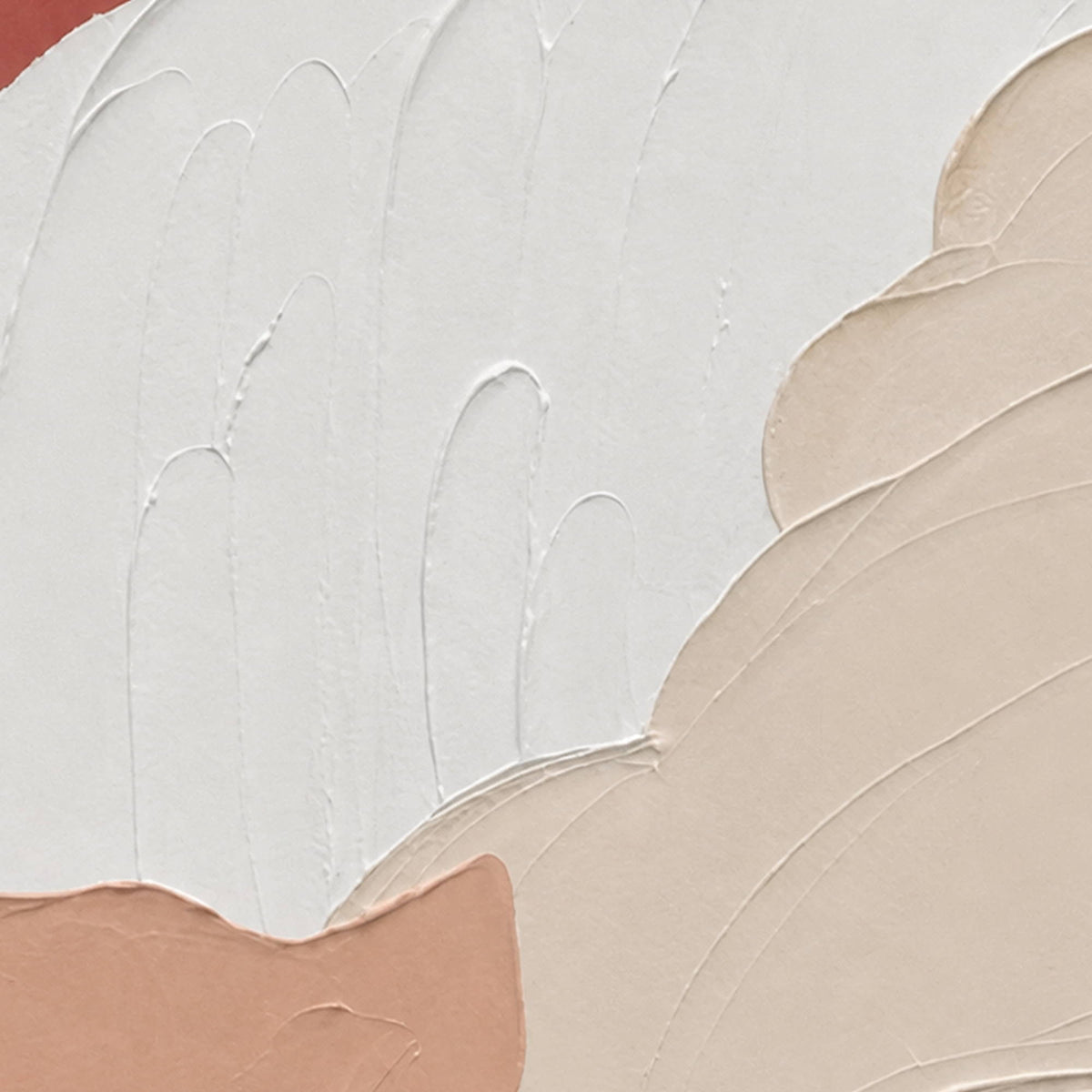 Close-up of gently raised white and peach curves with smooth surfaces and ridged edges.