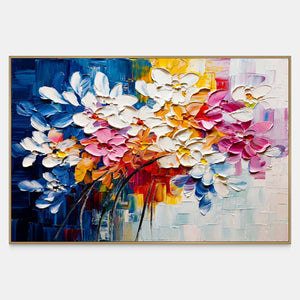White, pink, and gold petals sweeping across a cobalt blue canvas.