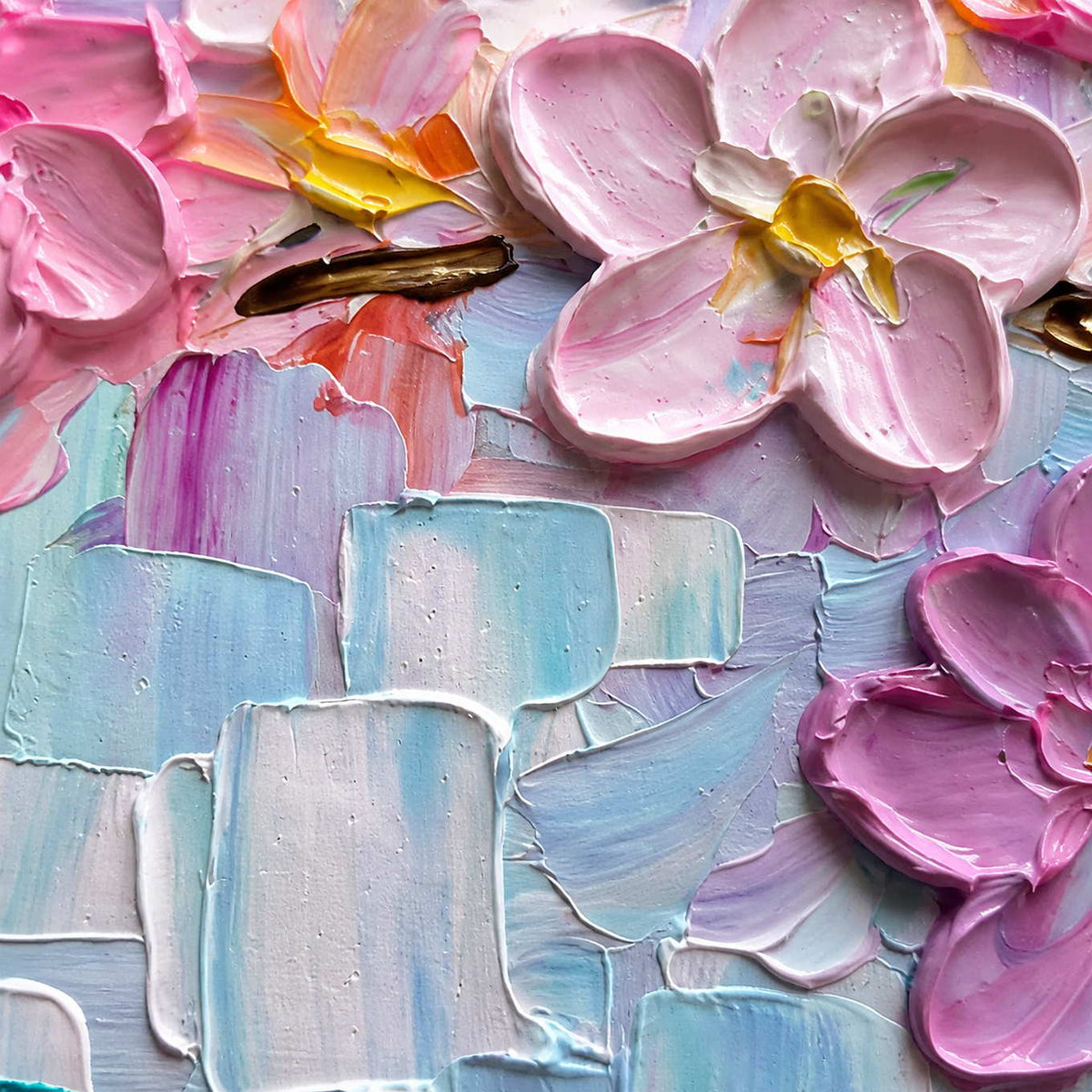Close-up of sculpted pink petals and blue palette-knife texture.