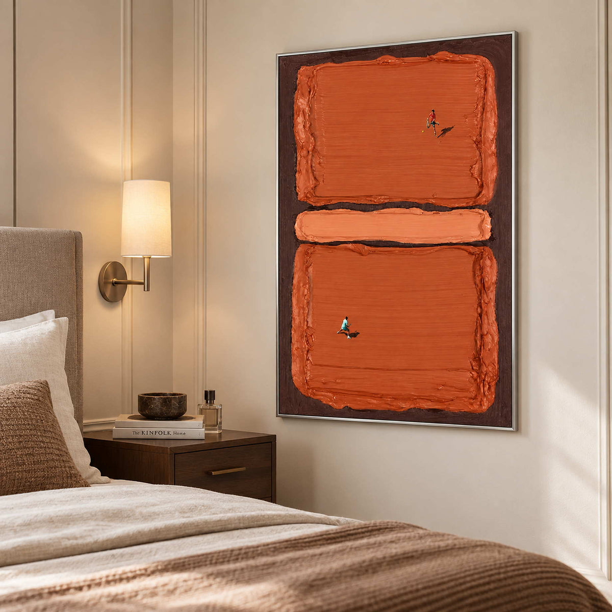 Two-player tennis artwork beside a bed with brown bedding and a wall-mounted lamp.