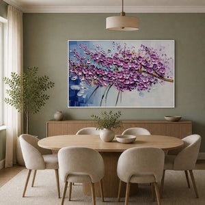 Purple botanical wall art displayed in a soft green dining room.