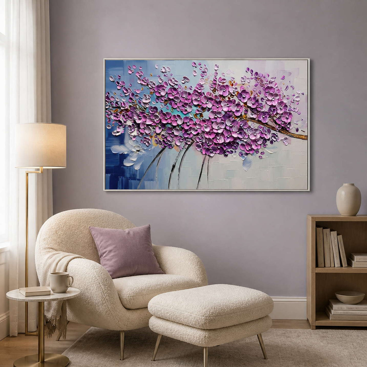 Lilac textured artwork displayed beside a soft reading chair.