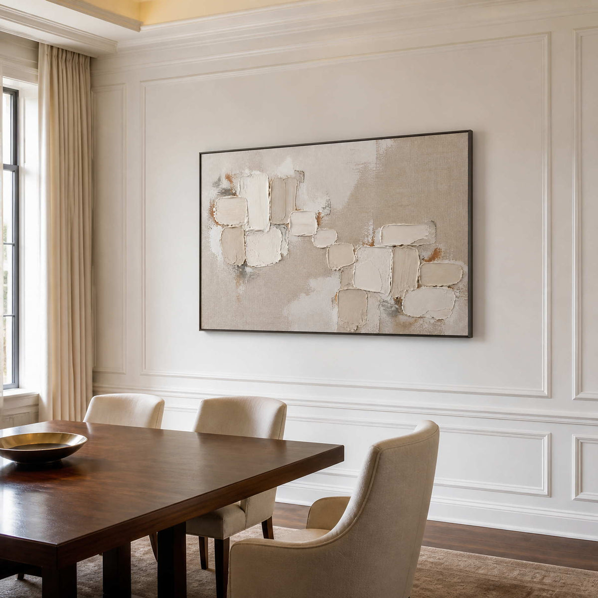 Neutral textured abstract wall art in a dining room with a black frame.