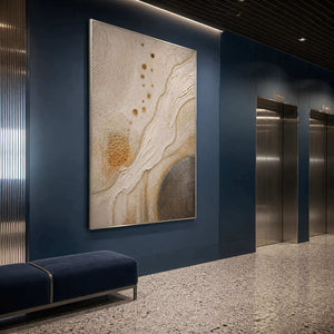 Ivory and gold organic currents wall art in a contemporary commercial lobby.