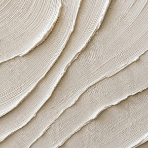 Close-up of layered ivory ridges and finely combed canvas texture.